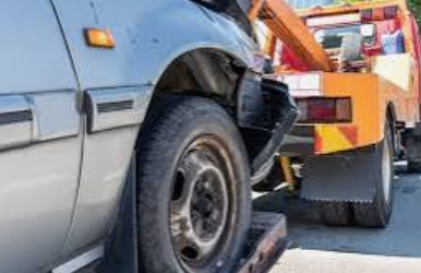 Vehicle being towed after an accident